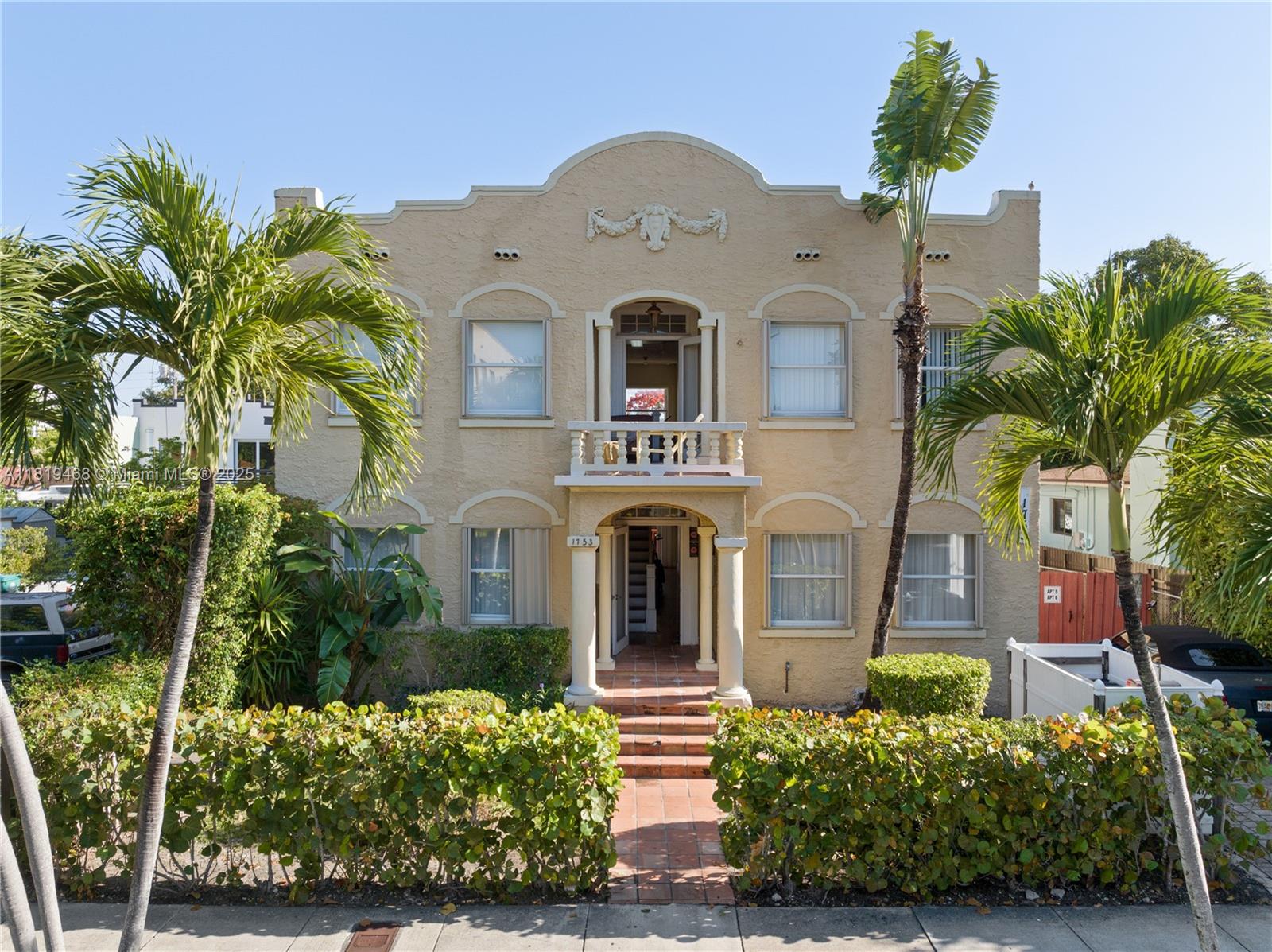 1753 Southwest 13th Street, Unit 1 Miami, FL 33145 - Photo 1 of 13 front view of a house with a garden