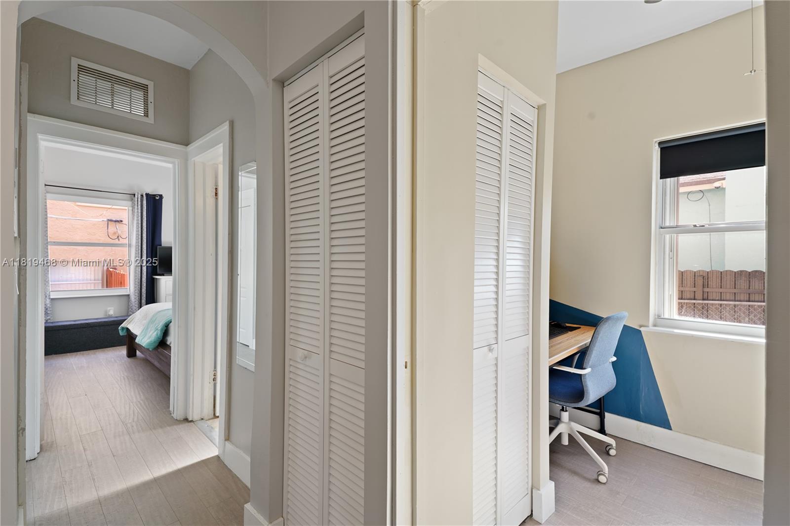 1753 Southwest 13th Street, Unit 1 Miami, FL 33145 - Photo 13 of 13 a view of a bedroom with a workspace