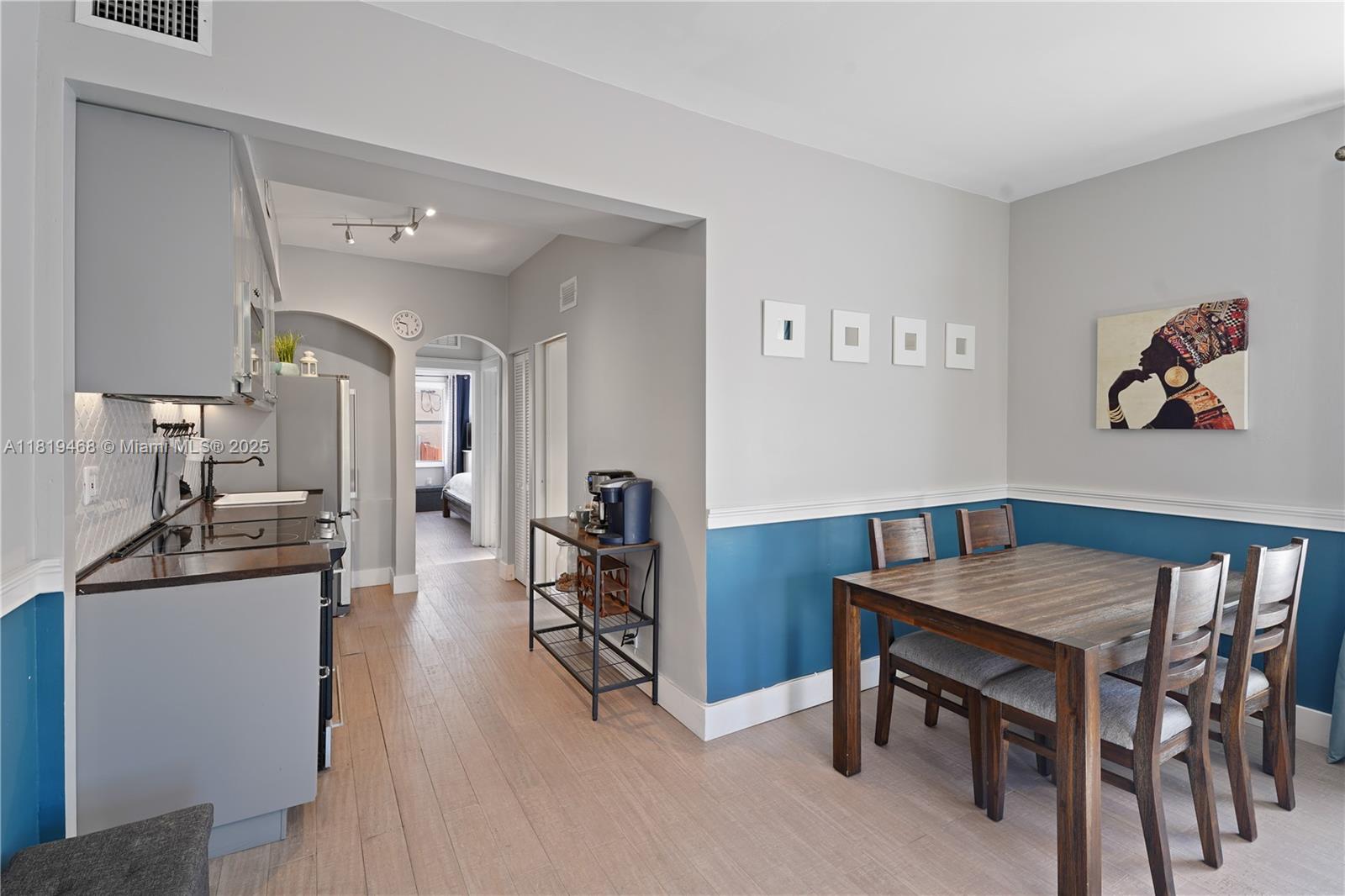 1753 Southwest 13th Street, Unit 1 Miami, FL 33145 - Photo 7 of 13 a view of a workspace with furniture and a livingroom