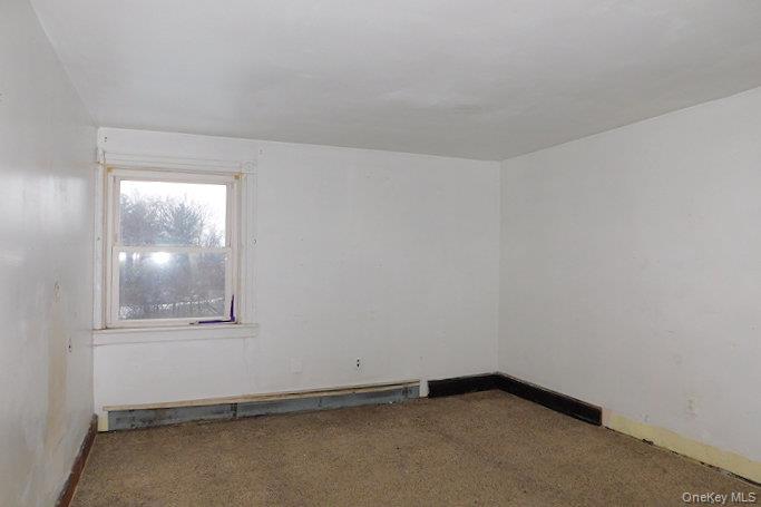 853 Salt Point Turnpike Poughkeepsie, NY 12601 - Photo 16 of 25 an empty room with a window