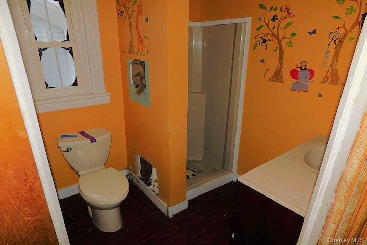 853 Salt Point Turnpike Poughkeepsie, NY 12601 - Photo 17 of 25 a bathroom with a toilet and a shower