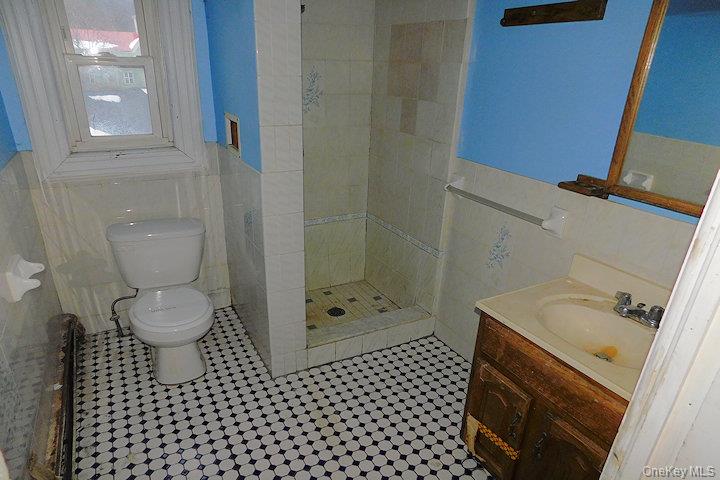 853 Salt Point Turnpike Poughkeepsie, NY 12601 - Photo 20 of 25 a bathroom with a granite countertop sink toilet and shower