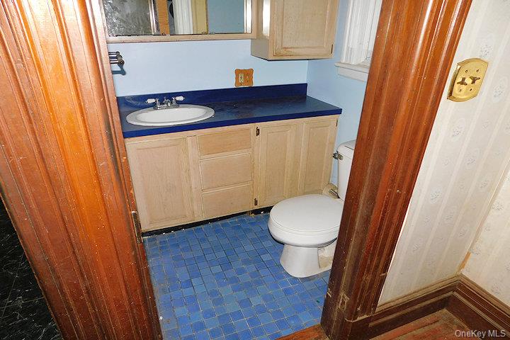 853 Salt Point Turnpike Poughkeepsie, NY 12601 - Photo 23 of 25 a bathroom with a sink and a toilet