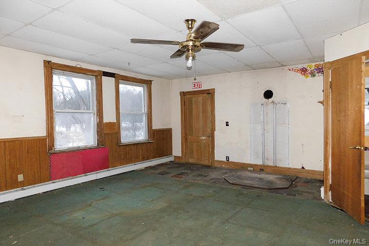 853 Salt Point Turnpike Poughkeepsie, NY 12601 - Photo 4 of 25 a view of an empty room with a window