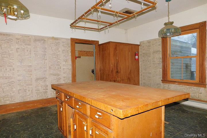 853 Salt Point Turnpike Poughkeepsie, NY 12601 - Photo 7 of 25 a bathroom with a sink a mirror and a shower