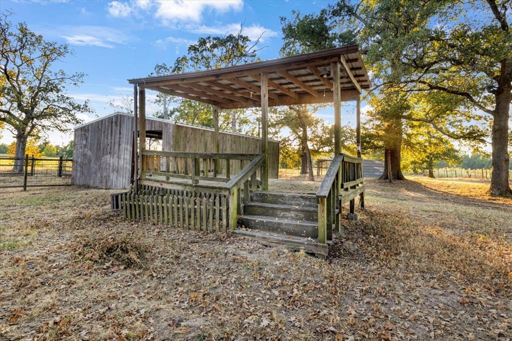 1809 County Road Winnsboro, TX 75494 - Photo 23 of 39 a view of outdoor space and deck