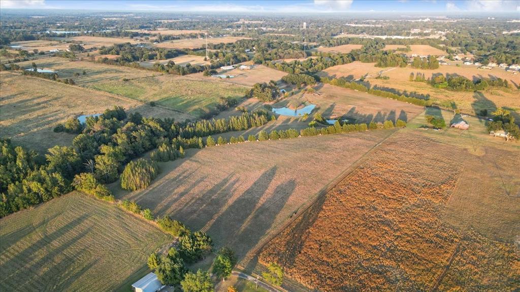 1809 County Road Winnsboro, TX 75494 - Photo 27 of 39 an aerial view of residential houses with outdoor space