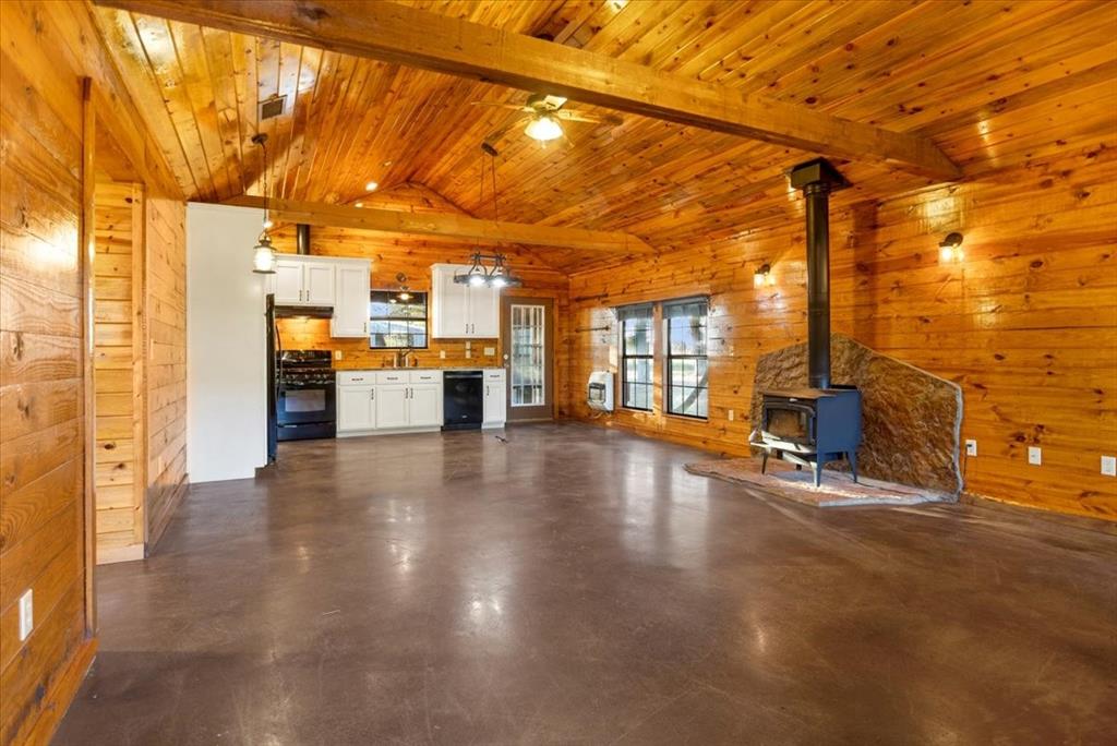 1809 County Road Winnsboro, TX 75494 - Photo 4 of 39 a view of a patio with table and chairs