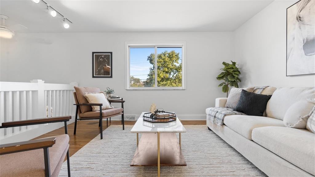 161 Warrencliff Drive Monaca, PA 15061 - Photo 11 of 40 a living room with furniture and a table