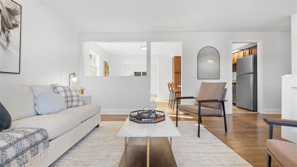 161 Warrencliff Drive Monaca, PA 15061 - Photo 14 of 40 a living room with furniture and wooden floor