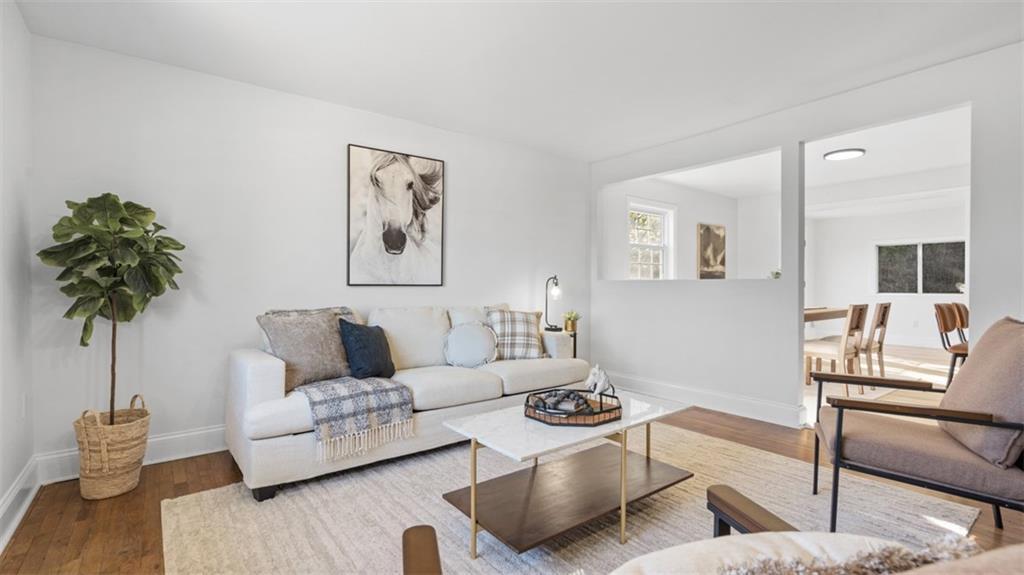 161 Warrencliff Drive Monaca, PA 15061 - Photo 15 of 40 a living room with furniture and a potted plant