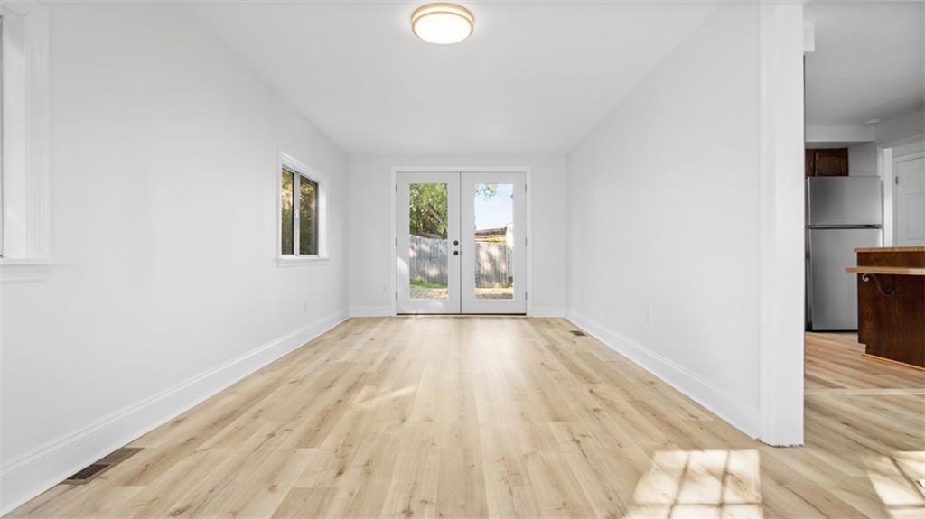 161 Warrencliff Drive Monaca, PA 15061 - Photo 23 of 40 a view of empty room with wooden floor and fan