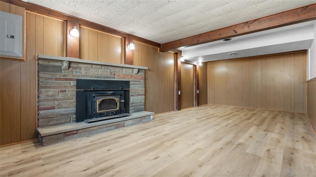 161 Warrencliff Drive Monaca, PA 15061 - Photo 30 of 40 a view of empty room with wooden floor and fireplace