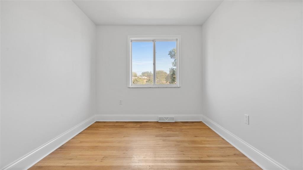 161 Warrencliff Drive Monaca, PA 15061 - Photo 6 of 40 a view of empty room with wooden floor