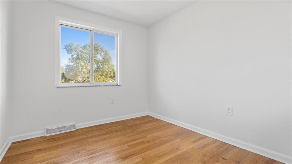 161 Warrencliff Drive Monaca, PA 15061 - Photo 8 of 40 wooden floor in an empty room