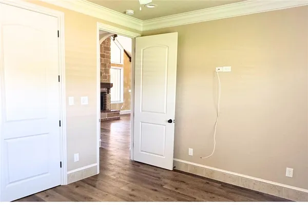 a view of closet area with empty racks