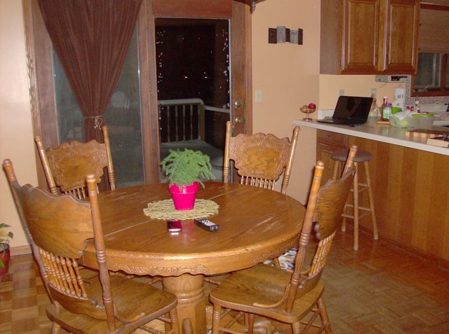 5351 South Mill Pond Road Rochelle, IL 61068 - Photo 5 of 17 a view of a dining room with furniture and wooden floor