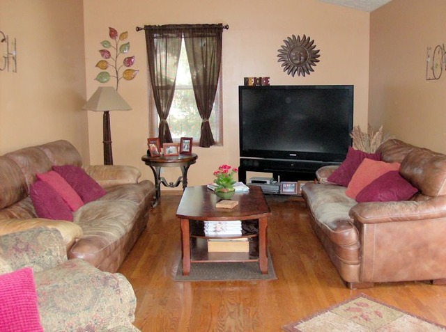 5351 South Mill Pond Road Rochelle, IL 61068 - Photo 7 of 17 a living room with furniture and a flat screen tv