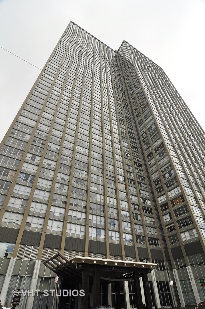 655 Irving Park Road, Unit 4606 Chicago, IL 60613 - Photo 1 of 15 a front view of a building