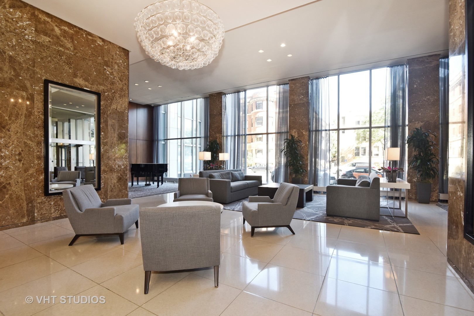 655 Irving Park Road, Unit 4606 Chicago, IL 60613 - Photo 11 of 15 a living room with furniture and a large window