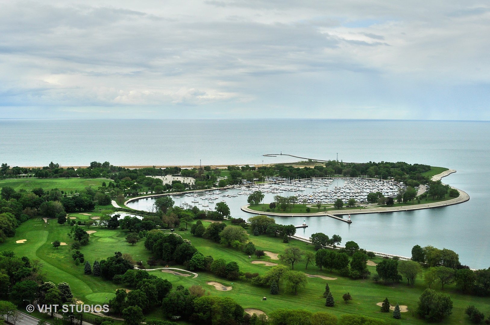 655 Irving Park Road, Unit 4606 Chicago, IL 60613 - Photo 3 of 15 a view of a lake with a city