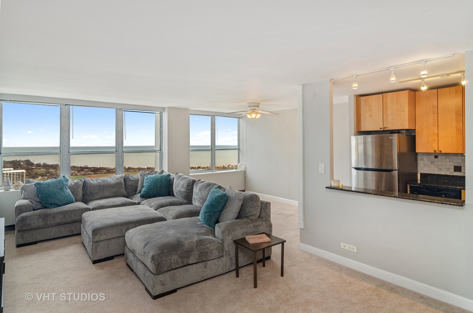 655 Irving Park Road, Unit 4606 Chicago, IL 60613 - Photo 5 of 15 a living room with furniture and a large window