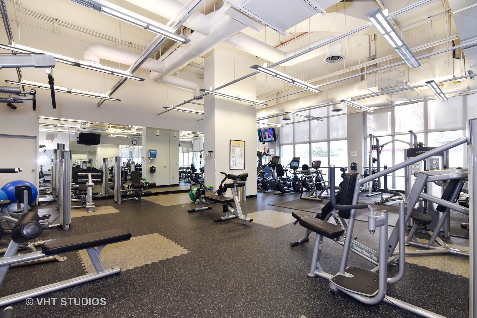 655 Irving Park Road, Unit 4606 Chicago, IL 60613 - Photo 10 of 15 a view of a room with gym equipment