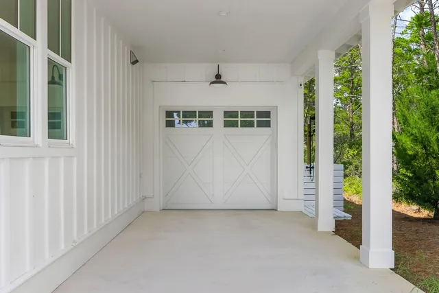 a kitchen with stainless steel appliances kitchen island a large island a stove a table and chairs in it