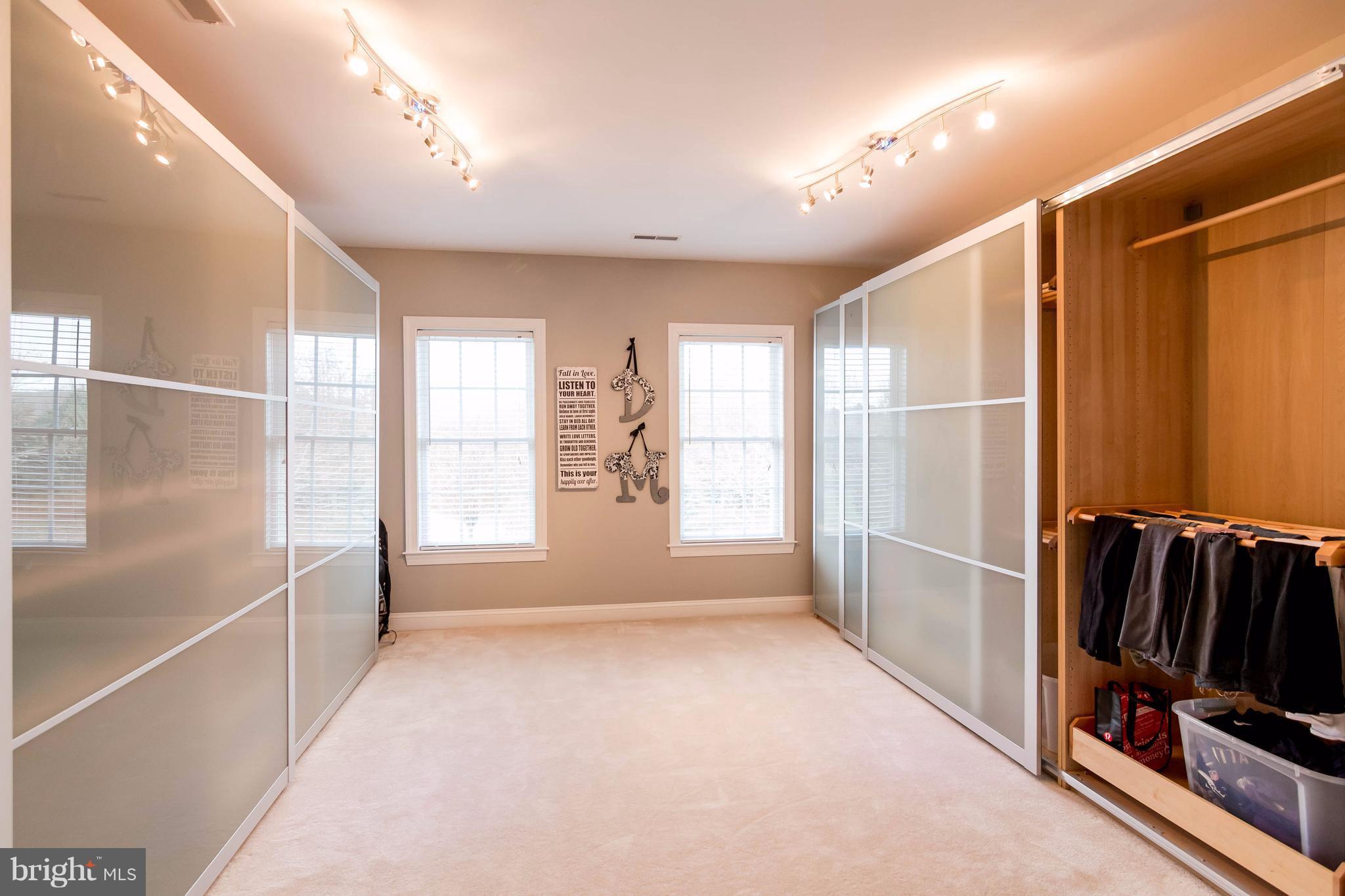 2404 Long Ridge Road Reisterstown, MD 21136 - Photo 19 of 30 a view of a hallway with windows and wardrobe