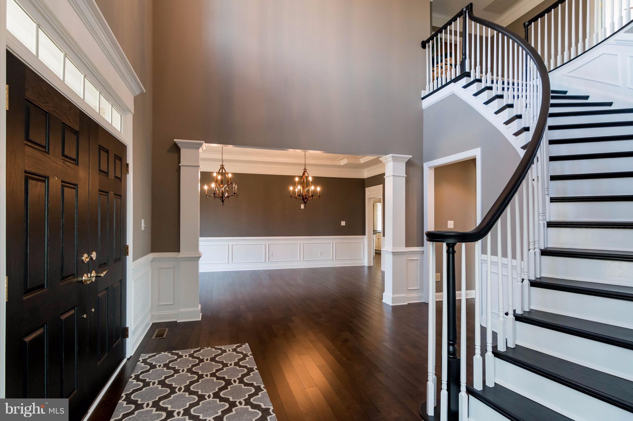 2404 Long Ridge Road Reisterstown, MD 21136 - Photo 3 of 30 a view of entryway with a front door and wooden floor