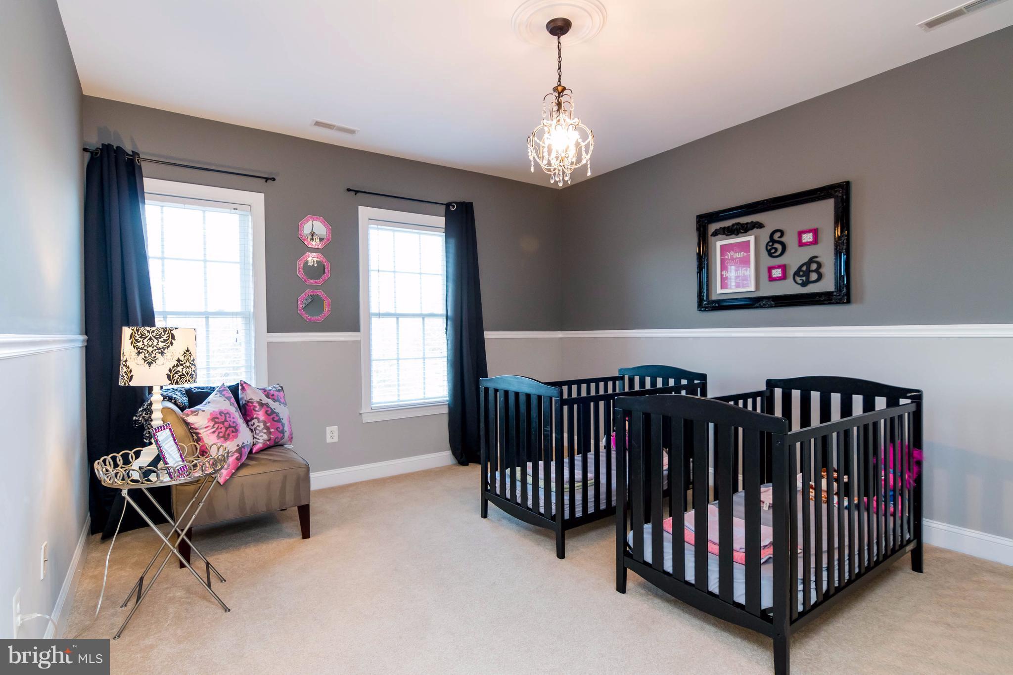 2404 Long Ridge Road Reisterstown, MD 21136 - Photo 22 of 30 a bedroom with furniture and a window