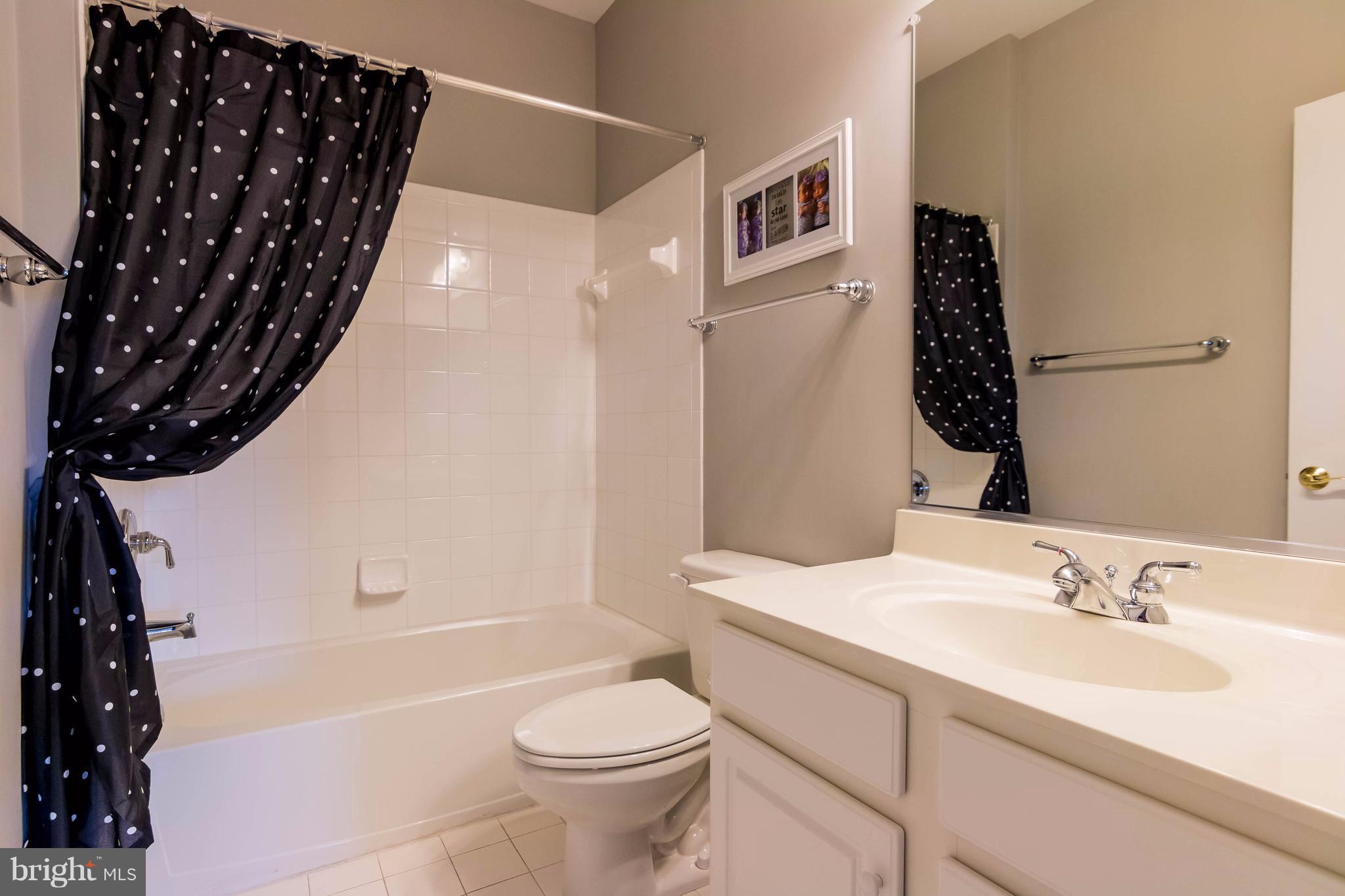 2404 Long Ridge Road Reisterstown, MD 21136 - Photo 23 of 30 a bathroom with a sink toilet and shower