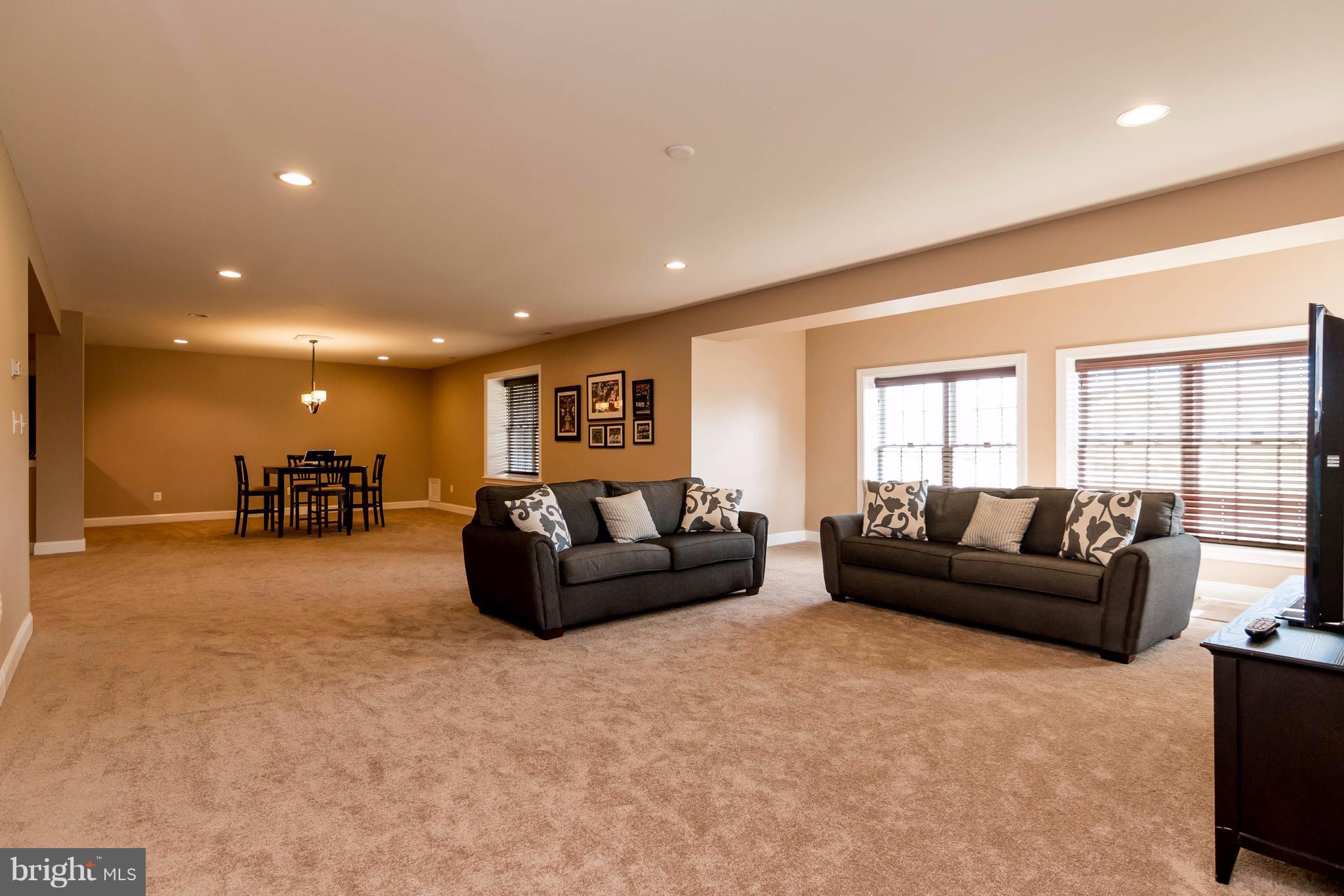 2404 Long Ridge Road Reisterstown, MD 21136 - Photo 25 of 30 a living room with furniture and a window