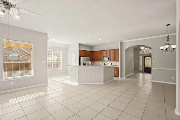 a view of a kitchen with furniture and window
