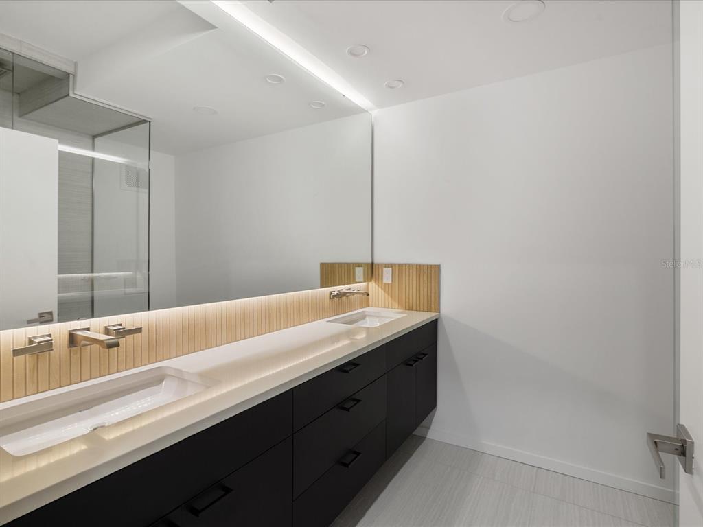 50 Coe Road, Unit 126 Belleair, FL 33756 - Photo 15 of 39 a bathroom with a sink and a mirror