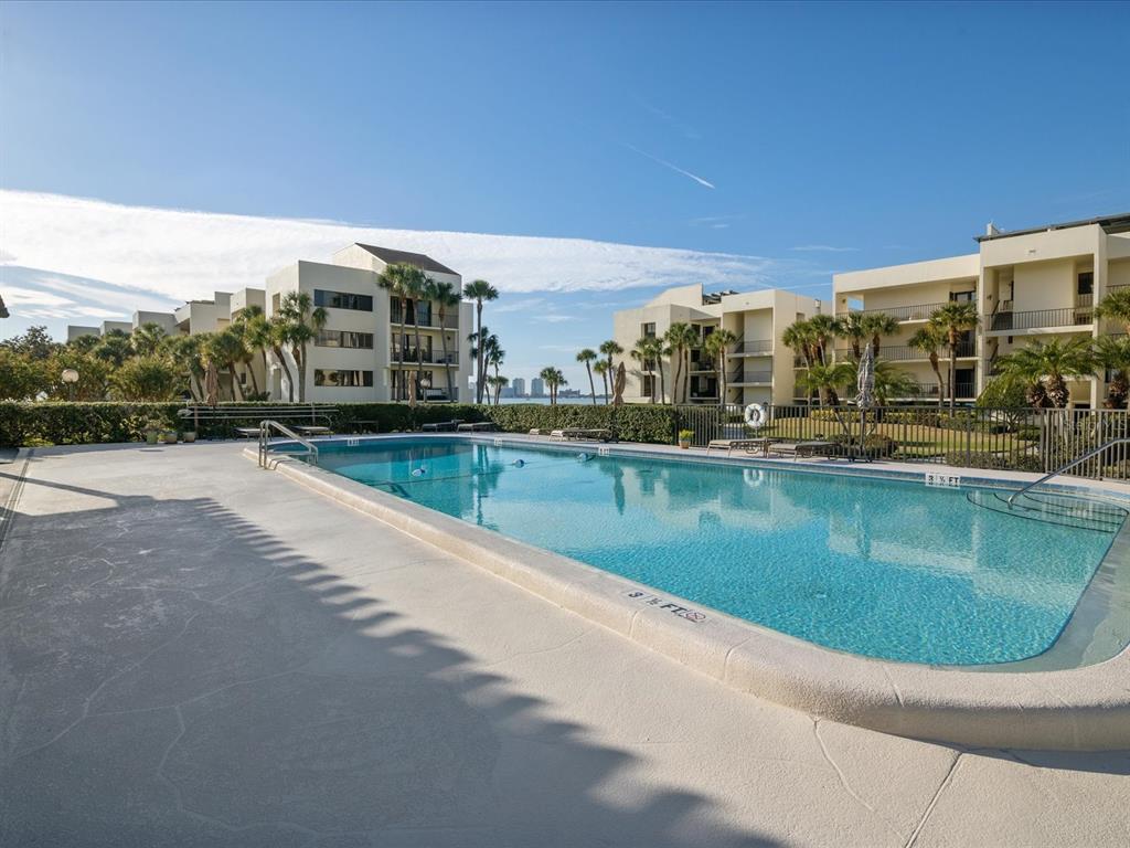 50 Coe Road, Unit 126 Belleair, FL 33756 - Photo 25 of 39 a view of a swimming pool with a terrace