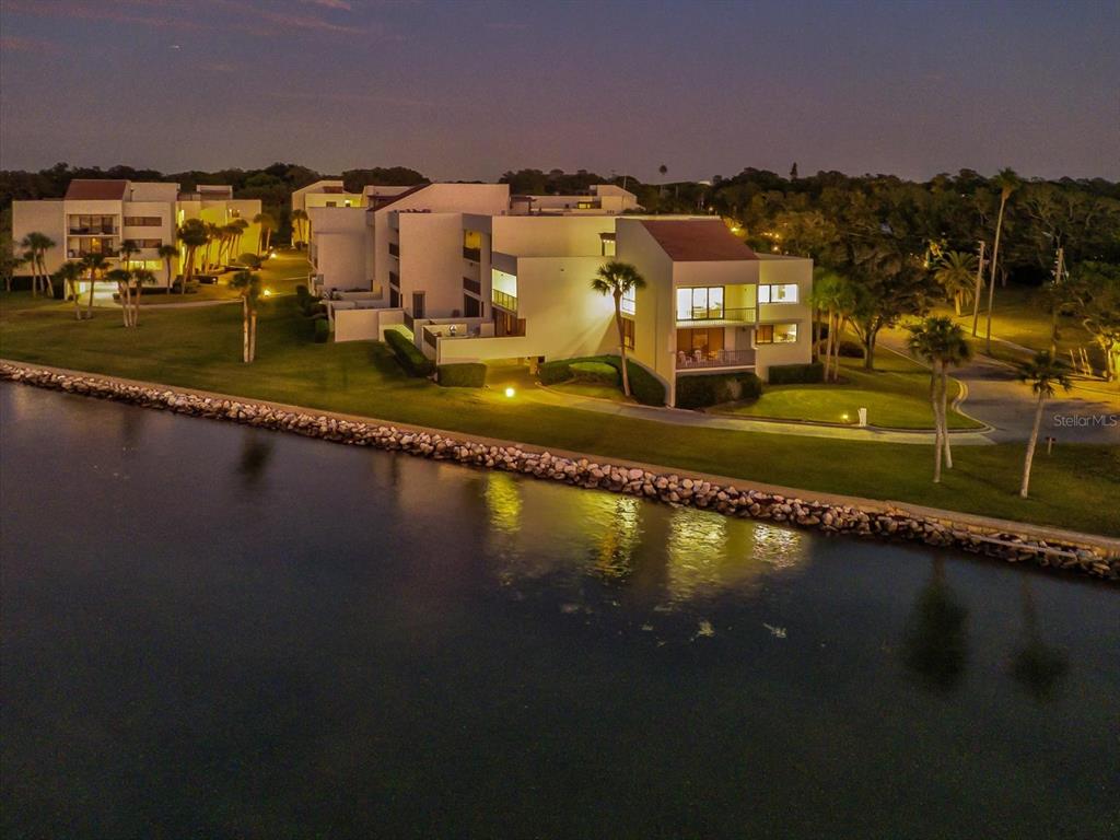50 Coe Road, Unit 126 Belleair, FL 33756 - Photo 31 of 39 a view of a swimming pool with an ocean view