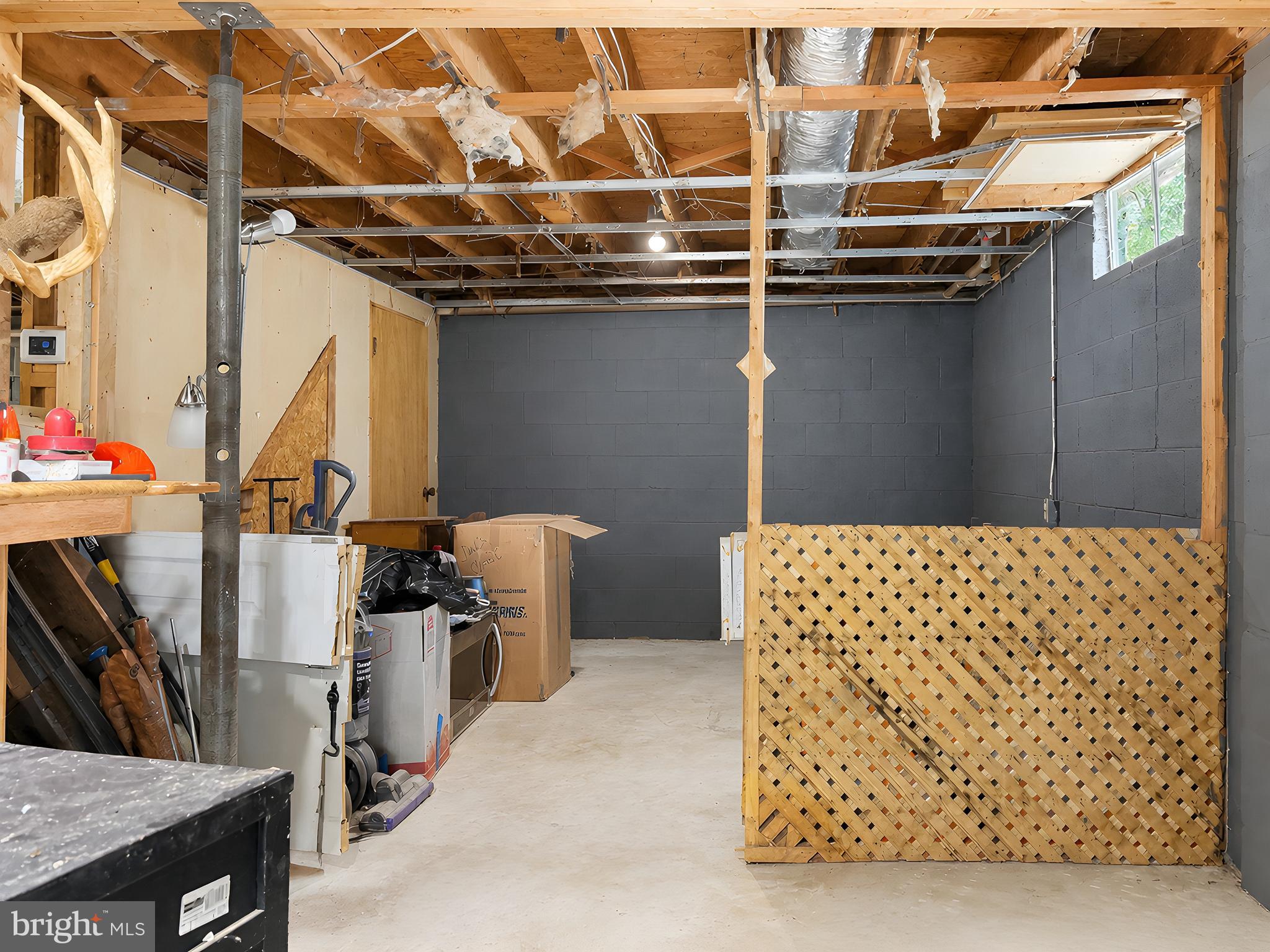 17248 Gum Landing Road St. Inigoes, MD 20684 - Photo 36 of 56 a view of storage and utility room