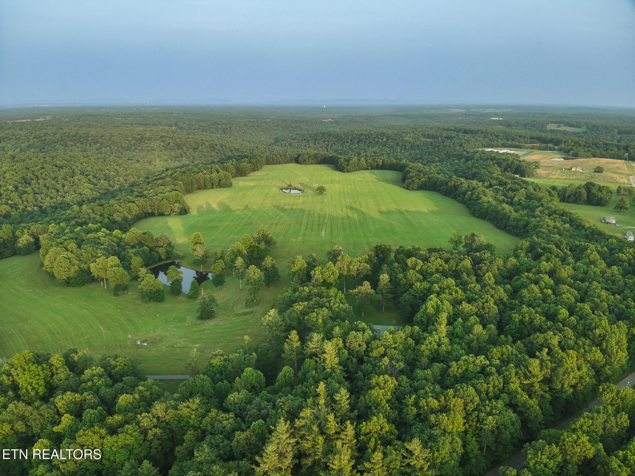 2457 Mayland Road Crossville, TN 38571 - Photo 20 of 33 a view of a field with an ocean