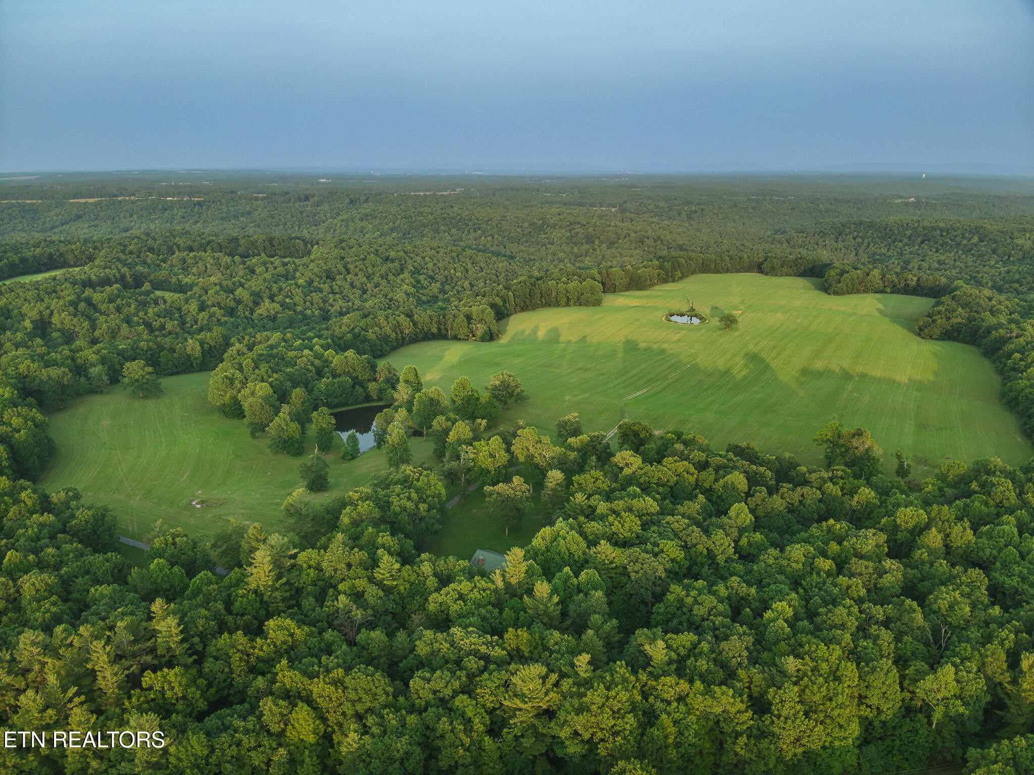 2457 Mayland Road Crossville, TN 38571 - Photo 21 of 33 a view of a field with an ocean
