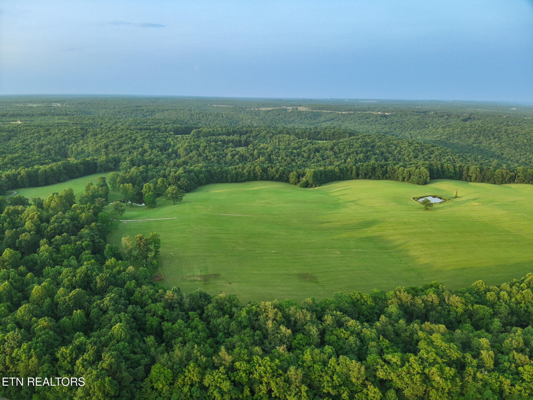 2457 Mayland Road Crossville, TN 38571 - Photo 22 of 33 a view of a field with an ocean