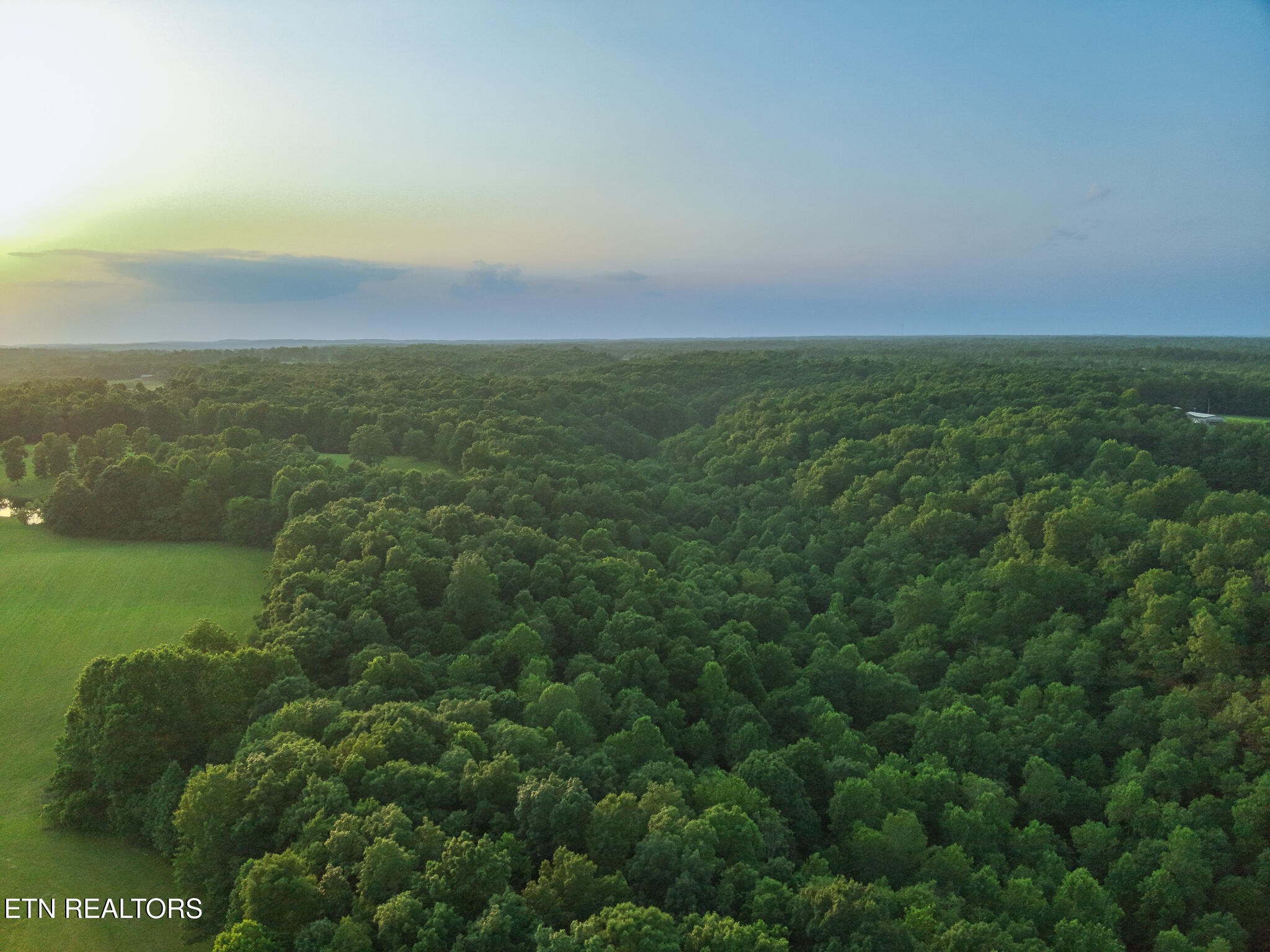 2457 Mayland Road Crossville, TN 38571 - Photo 28 of 37 a view of a field with an ocean
