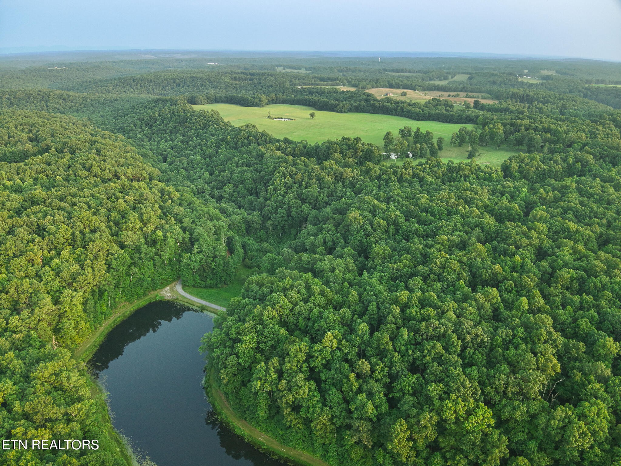 2457 Mayland Road Crossville, TN 38571 - Photo 30 of 33 a view of a field with an ocean