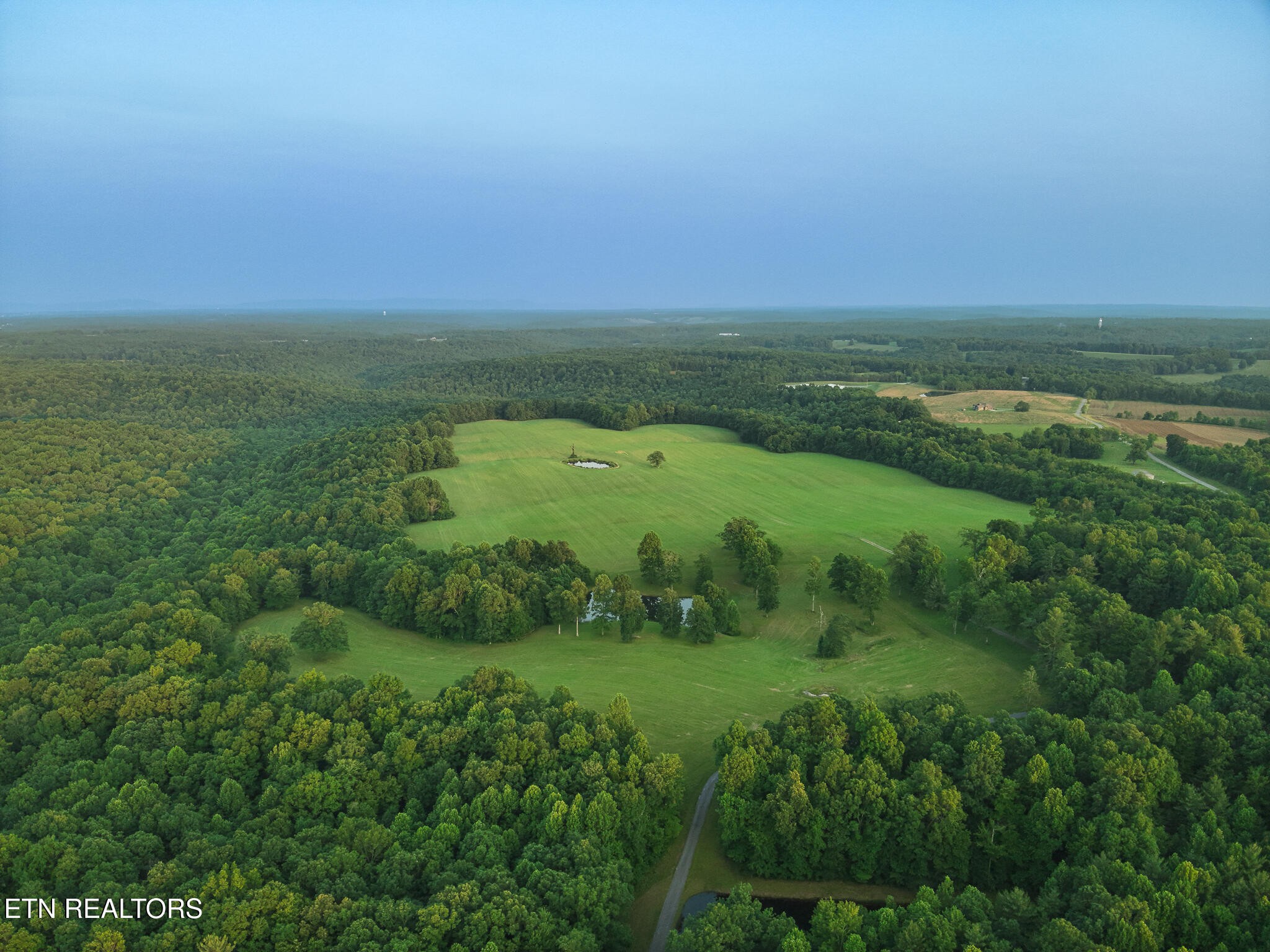 2457 Mayland Road Crossville, TN 38571 - Photo 33 of 33 a view of a field with an ocean