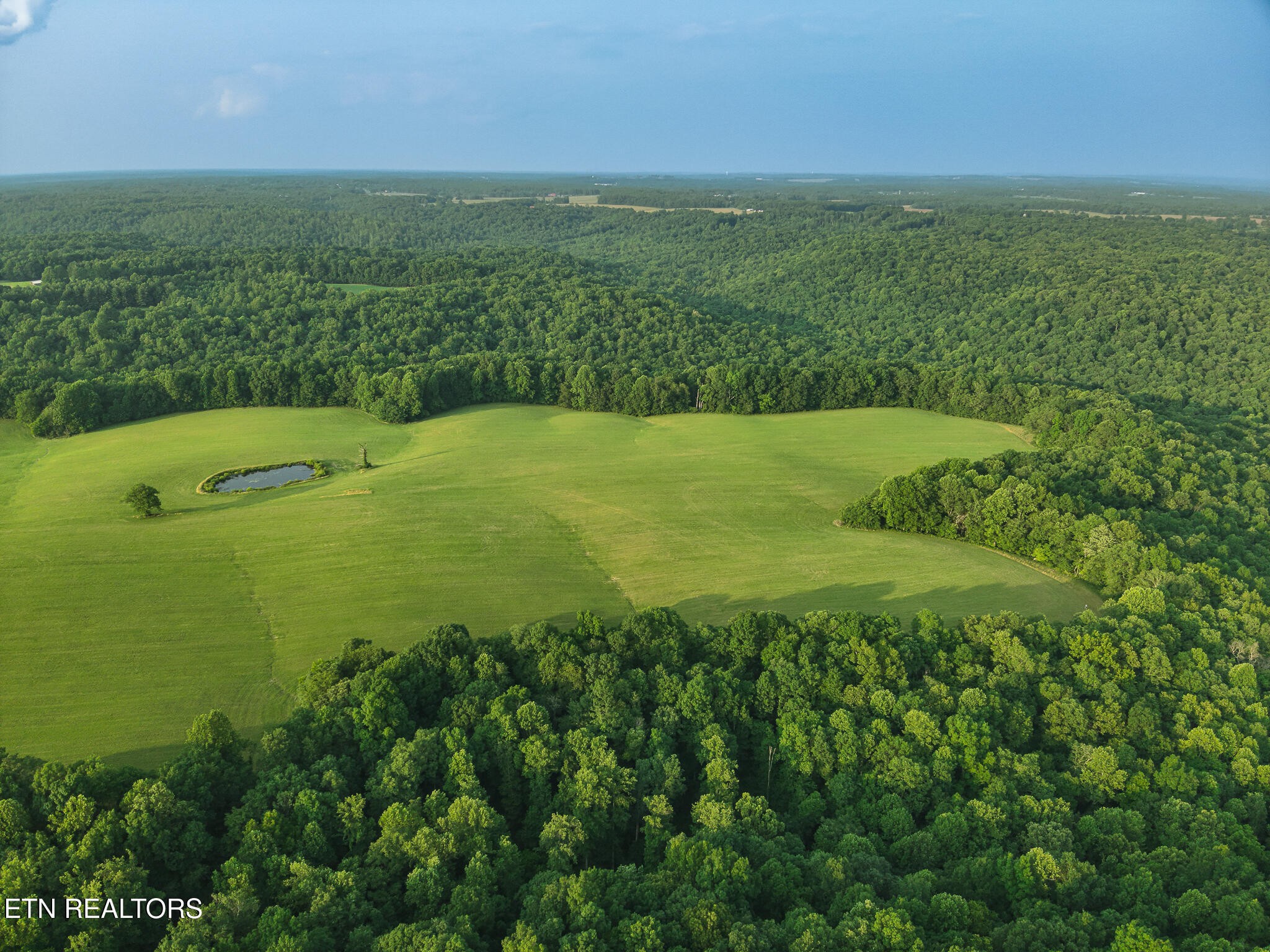 2457 Mayland Road Crossville, TN 38571 - Photo 5 of 37 a view of a field with an ocean