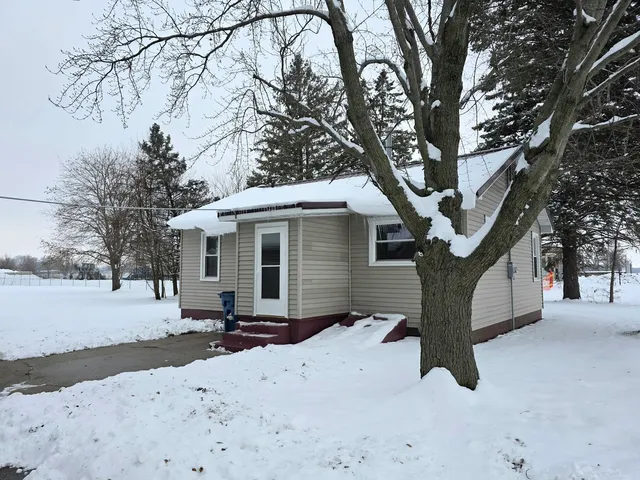 a view of a house with a snow in the snow