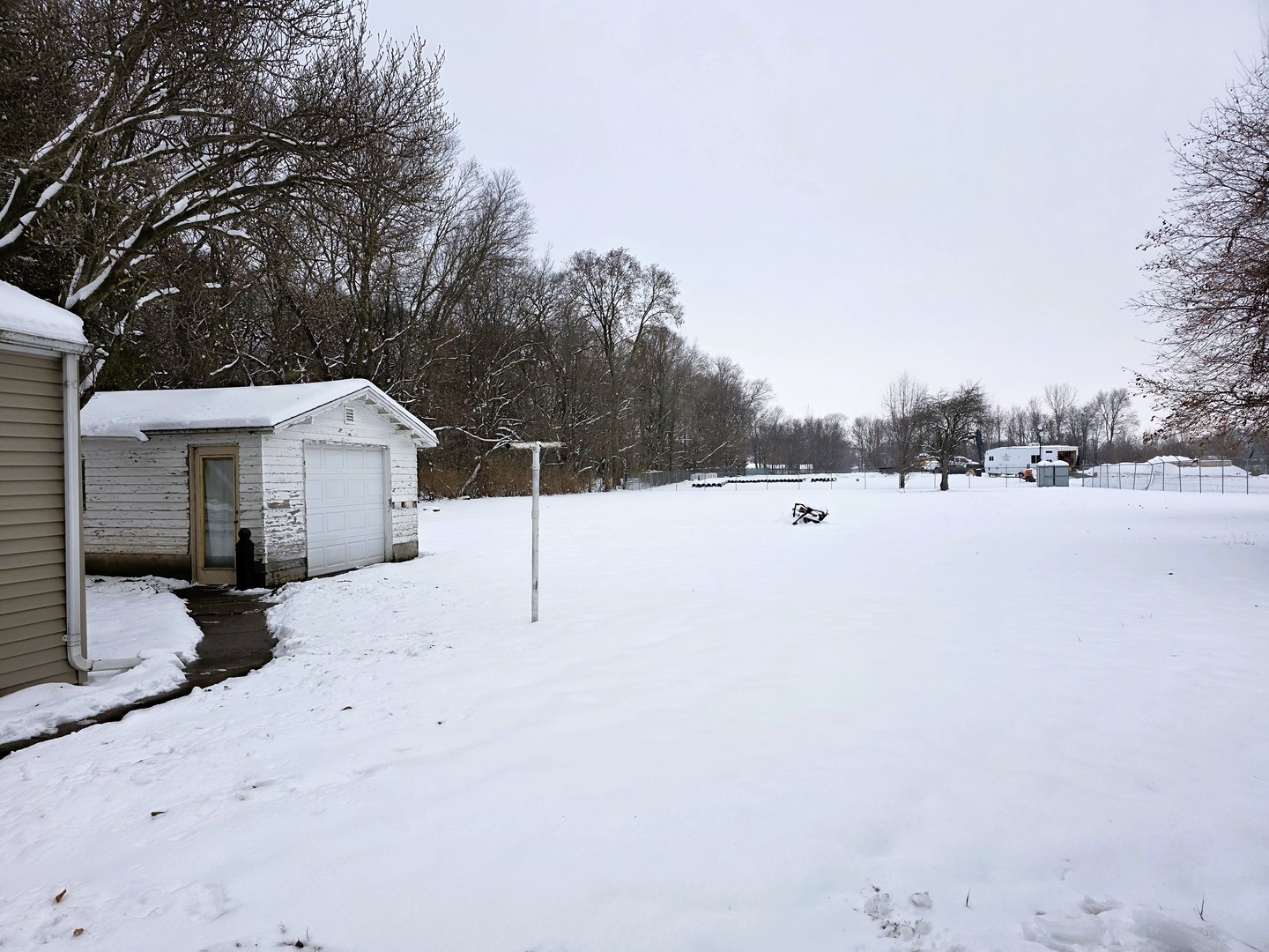 2909 West Le Fevre Road Sterling, IL 61081 - Photo 11 of 11 a street view covered with snow