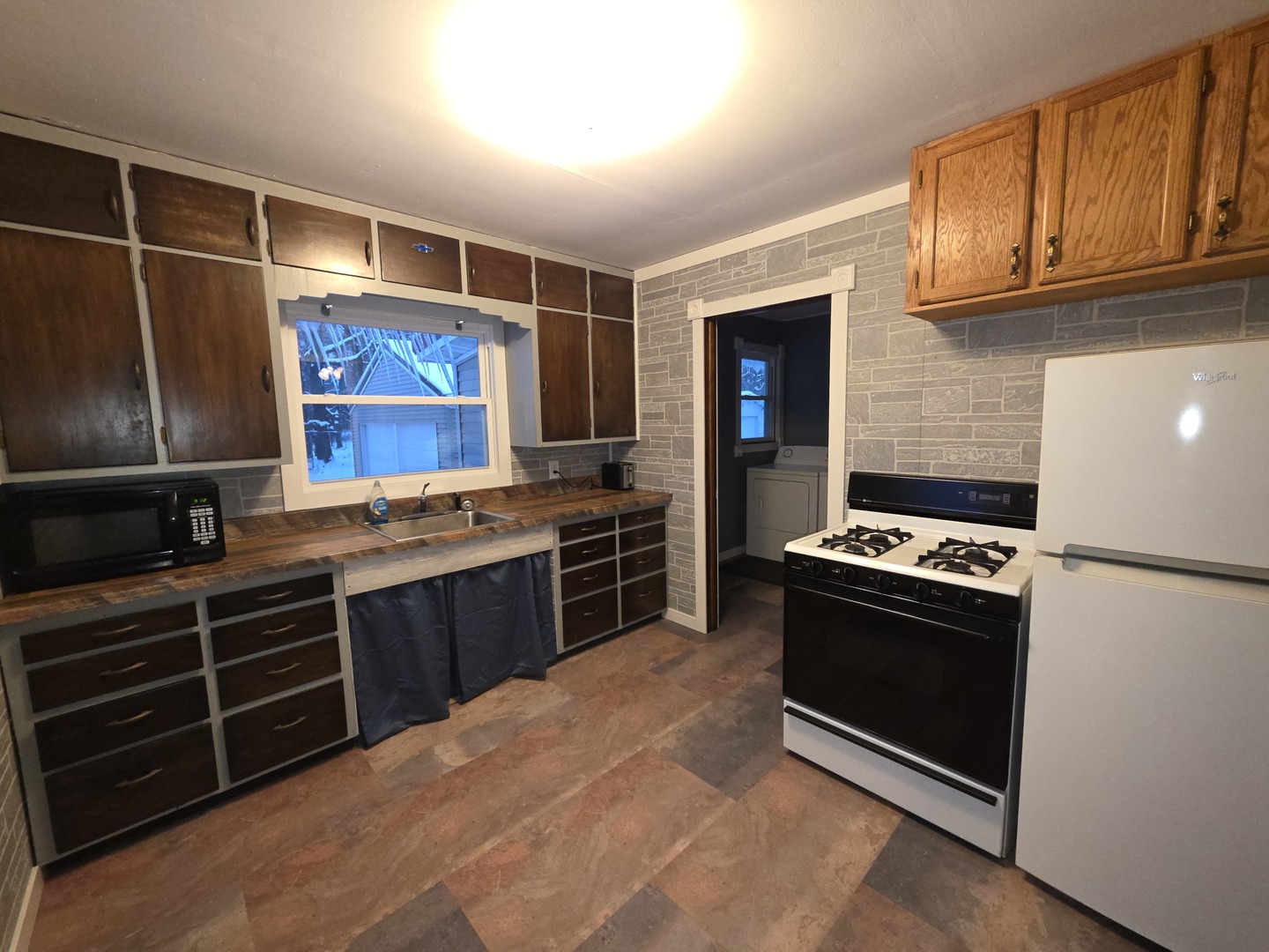 2909 West Le Fevre Road Sterling, IL 61081 - Photo 5 of 11 a kitchen with stainless steel appliances granite countertop a stove and a refrigerator