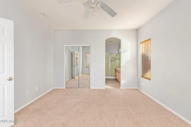 a view of a room with large windows