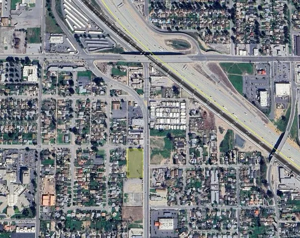 a view of a park with large trees